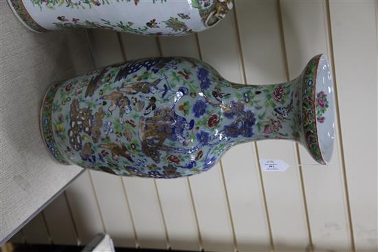 A large Chinese Canton-decorated celadon ground baluster vase, Daoguang period (1821-50), 58.5cm